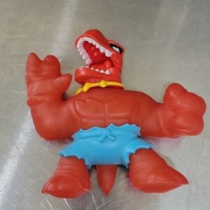 Goo Jit Zu- Dino Power Superheroe Squishy- Tyro